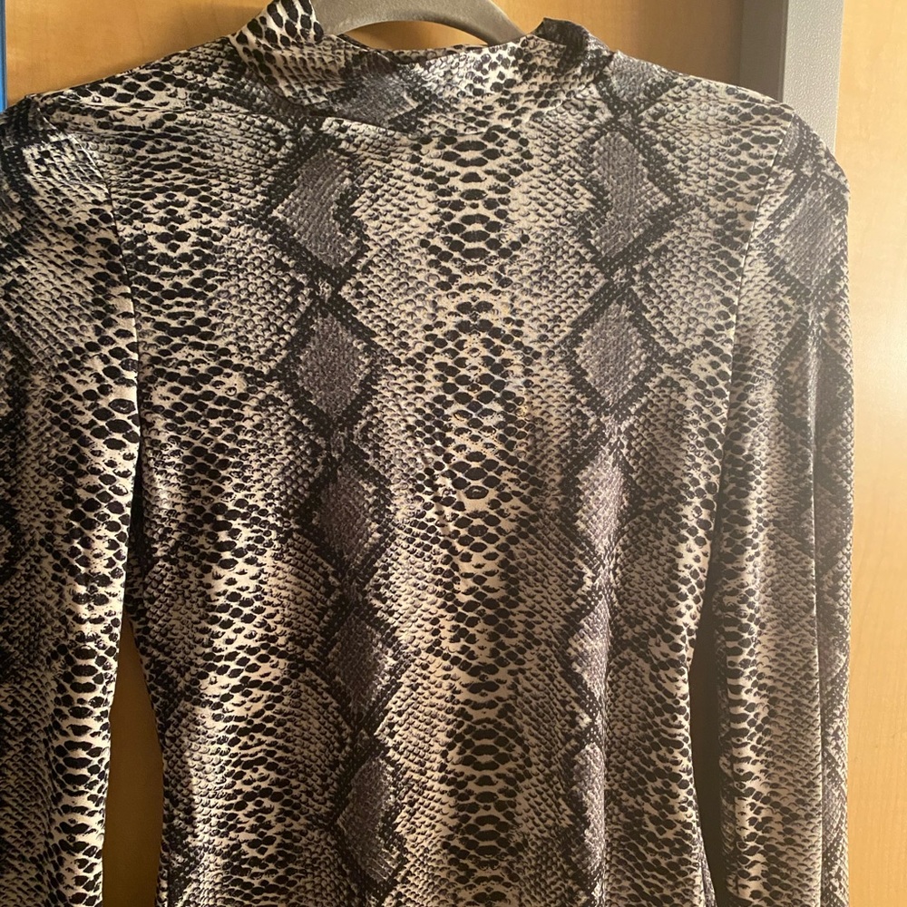 long sleeve snake print shirt.